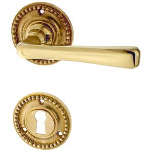Zimmertürbeschlag aus Messing patiniert matt gold runde Form
